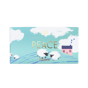 Product packaging with sheep and a house design, featuring the word 'PEACE' and the brand 'musee'.