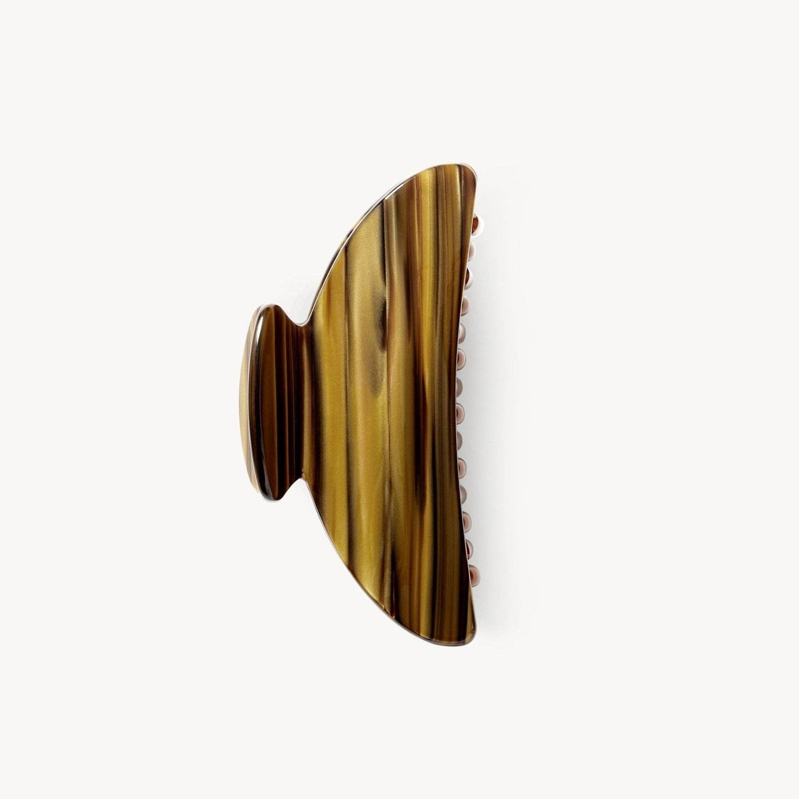 Wooden hair clip with a natural grain pattern on a white background