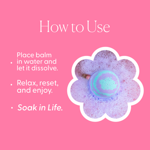 Bath bomb with text on a pink background