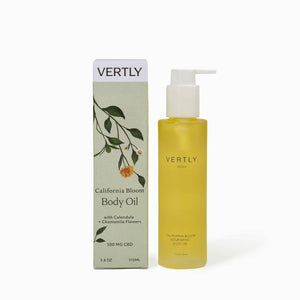 Vertly California Bloom Body Oil with pump and packaging on a white background