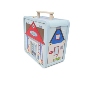 Children's toy suitcase with house design on a white background