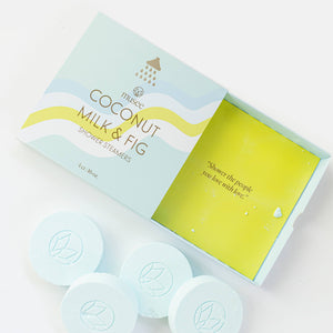 Coconut Milk & Fig shower steamers with packaging on a white background