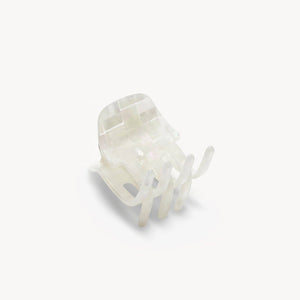 White plastic clip on a white background