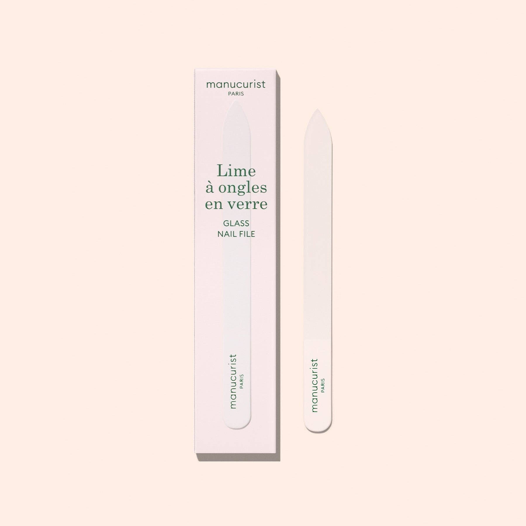 Manucurist glass nail file with packaging on a light beige background