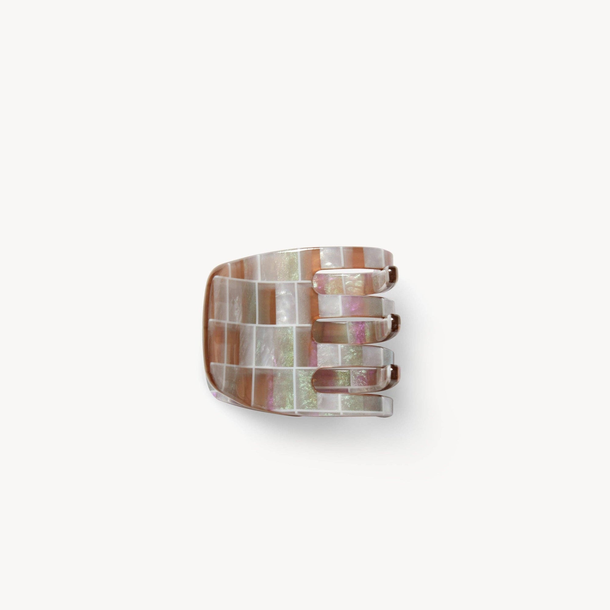 Decorative ring with mosaic pattern on a white background