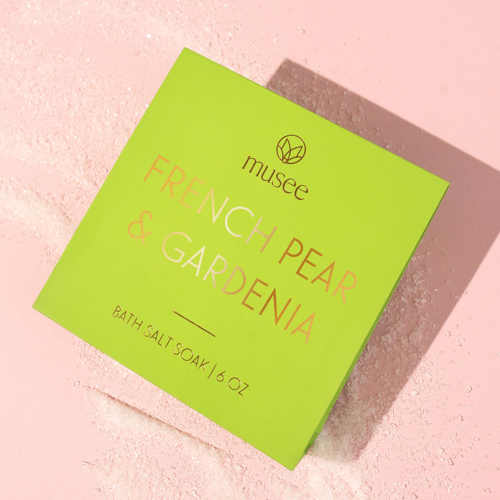 Bath salt packaging with 'musee' brand and 'French Pear & Gardenia' scent on a white background.