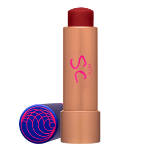 Lip balm with red top and brown body on a white background