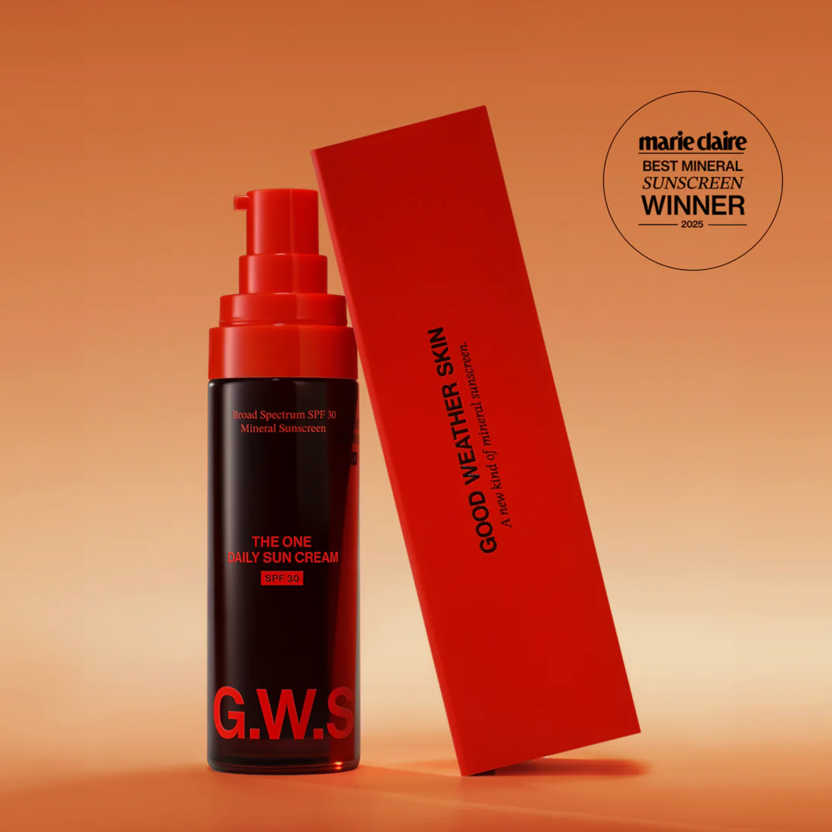 A bottle of Good Weather Daily Sun Cream next to a red box. 