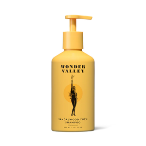 A bottle of the Sandalwood Yuzu hair shampoo, made by Wonder Valley in California