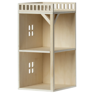 Wooden dollhouse with two levels on a white background