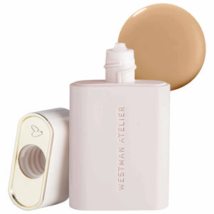 Westman Atelier complexion drops bottle with a swatch of brown shade on a white background