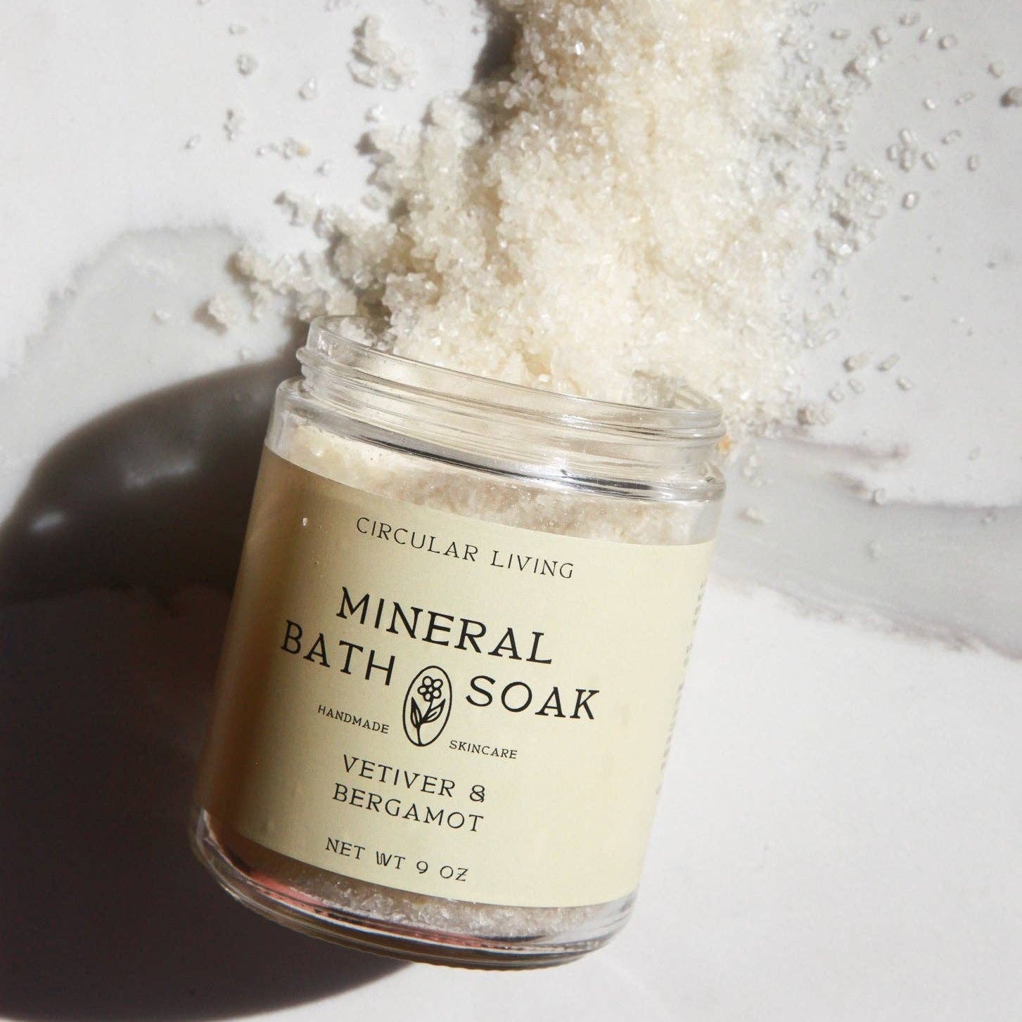 Jar of Mineral Bath Soak with a label on a light background