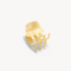 Small yellow chair on a white background
