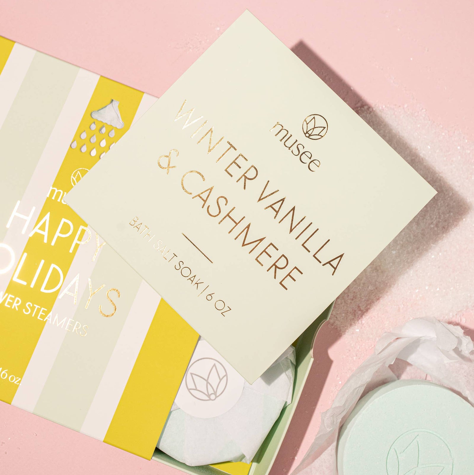 Bath salt soak packaging with 'musee' branding on a light green background