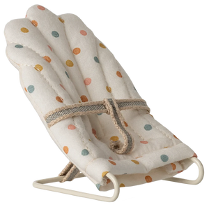 A small, multicolored dotted baby carrier with a metal frame and fabric covering, designed for toy rabbits and baby mice.