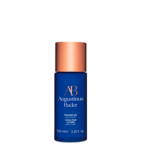 A blue bottle of the body oil with a copper cap