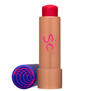 Lip balm with a red cap and brown body on a white background