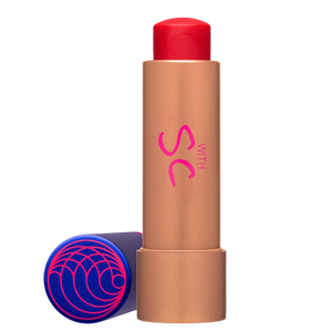 Lip balm with red cap and brown body on a white background