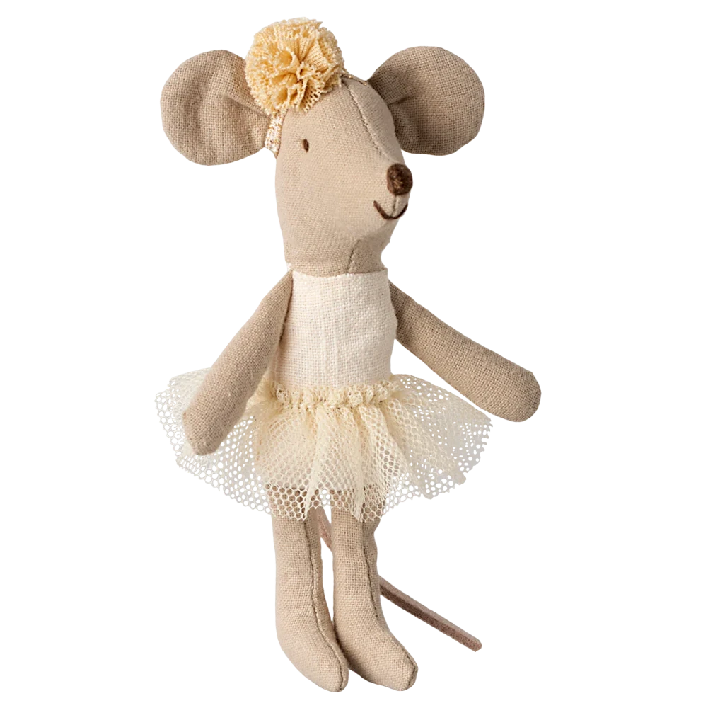 A toy mouse dressed as a ballerina with an off white colored tutu and a headband with a flower on top.