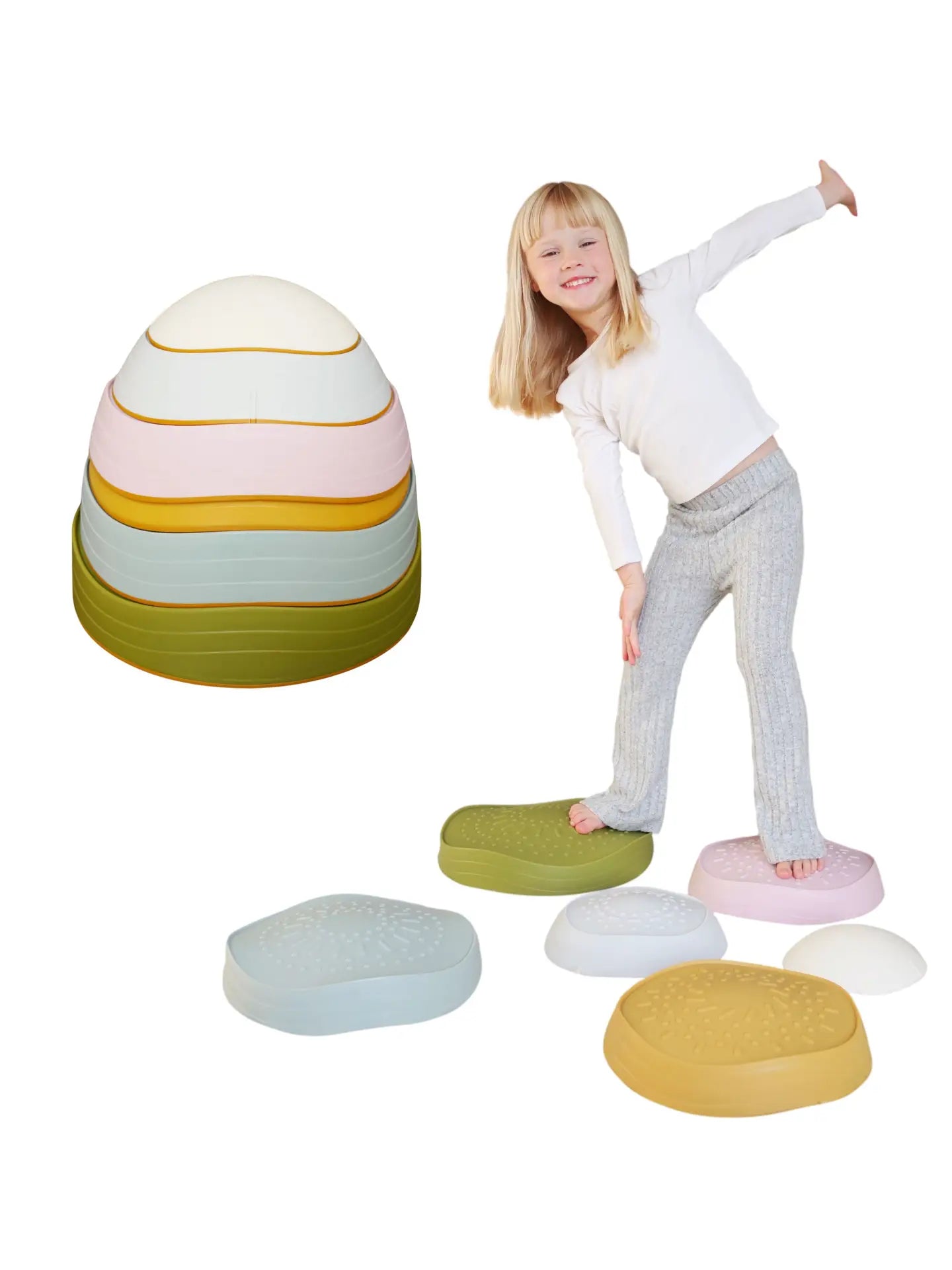 A child standing on a set of Marlowe & Co. Balance Stepping Stones. A six piece set with anti-slip rubber lining. 