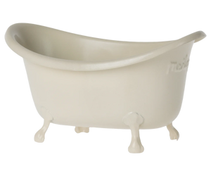 A small, white, metal mouse bathtub with four legs designed for toy mice.
