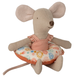 Stuffed mouse toy with a floral float on a white background