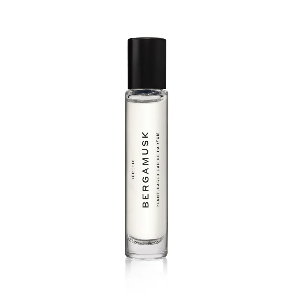 A rollerball of Heretic Bergamusk perfume, with a black cap. 