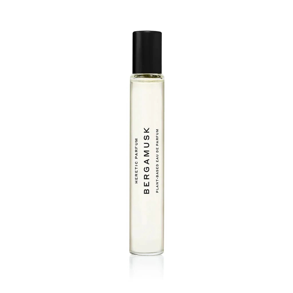 A rollerball of Heretic Bergamusk perfume, with a black cap. 