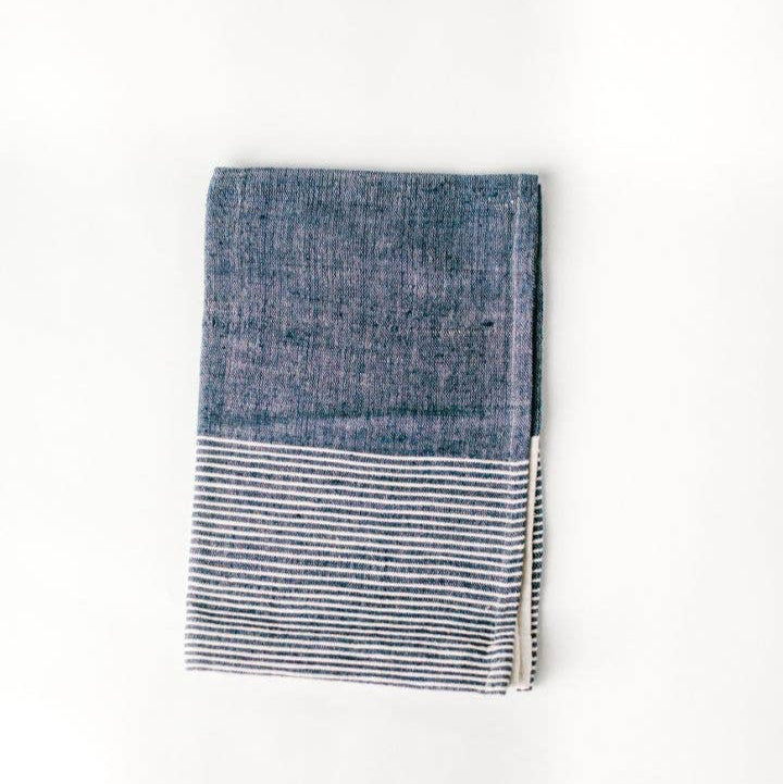 A color block tea towel in blue and white. 