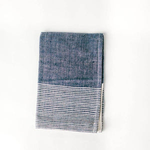 A color block tea towel in blue and white. 