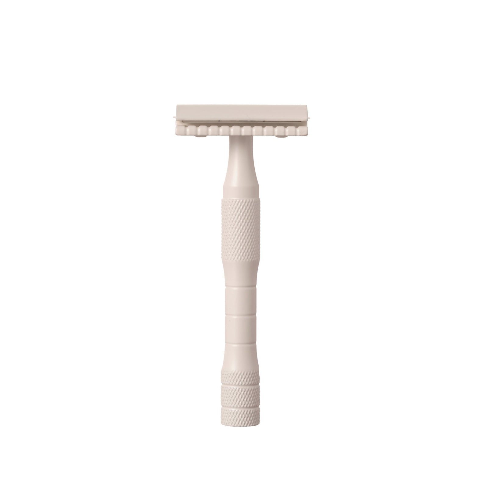 A brass safety razor with a stainless steel blade, cream-colored handle, and textured grip area.