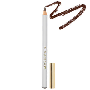 Westman Atelier eye liner pencil with gold cap on white background