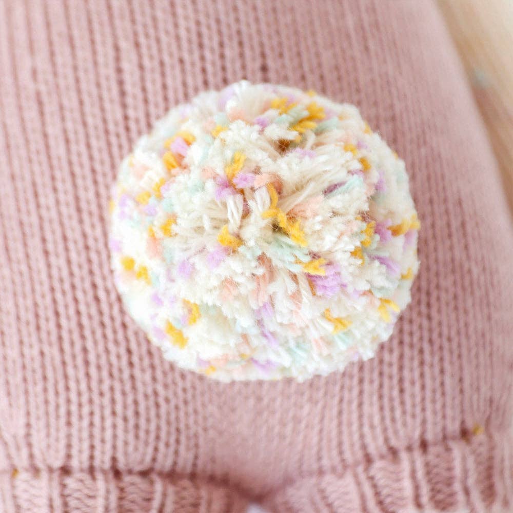 A detail of the knit tail of Harper the bunny