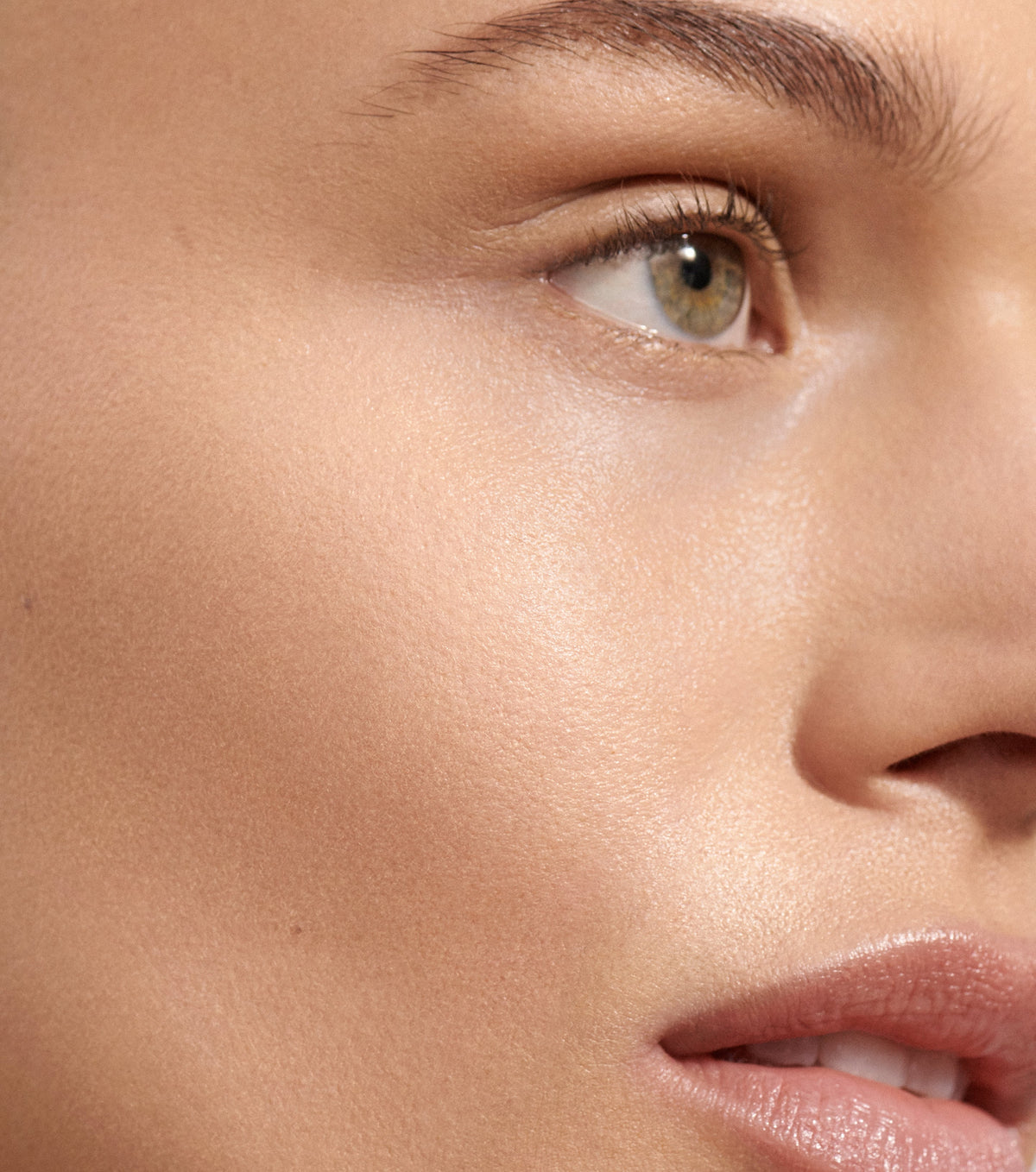 Close-up of a person's eye with a neutral background