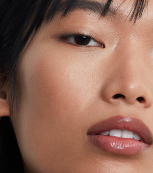 Close-up of a person's face with a focus on the skin texture.