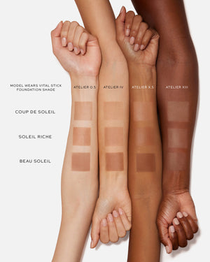 Swatch comparison of foundation shades on a model's arm with text labels.
