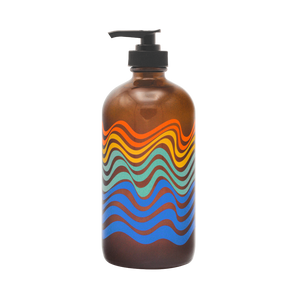 Brown bottle with colorful wavy pattern and black pump on a white background