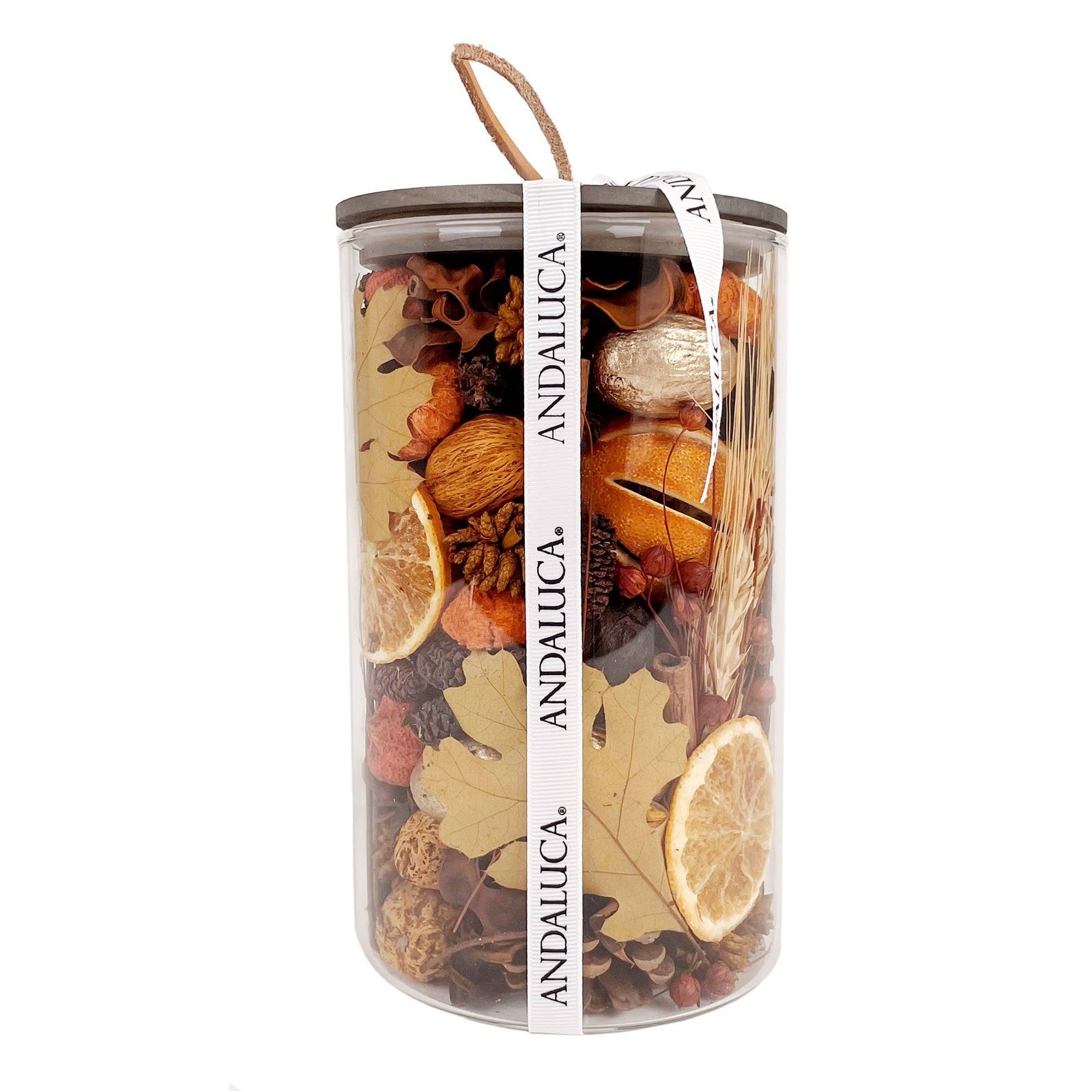 A transparent container filled with dried fruits, spices, and herbs with a brand name on a white background.