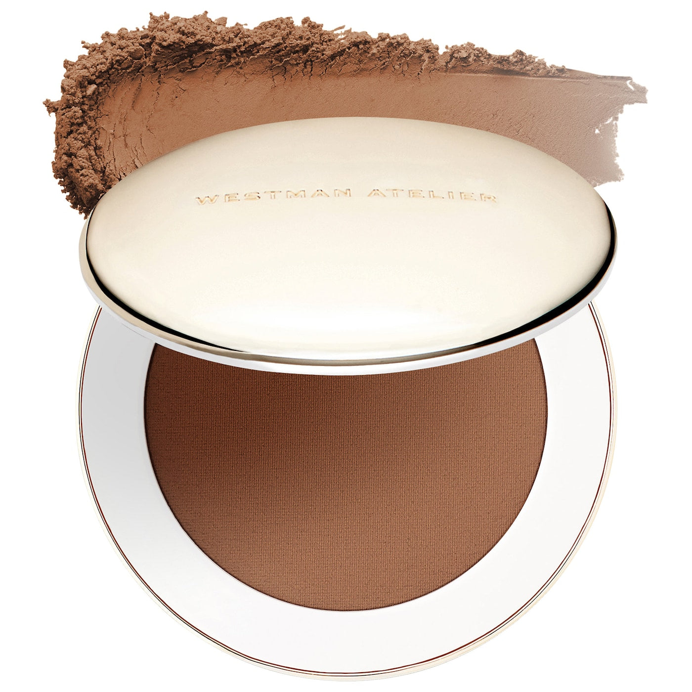 Compact powder in a round container with a white lid on a white background