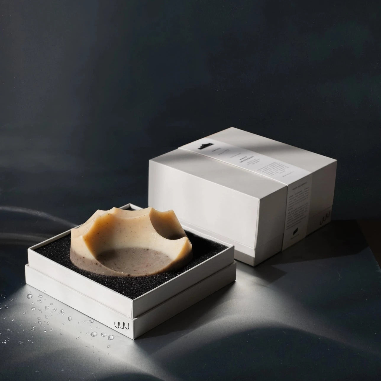 A cardamom vetiver architectural soap, made by hand by UME studios