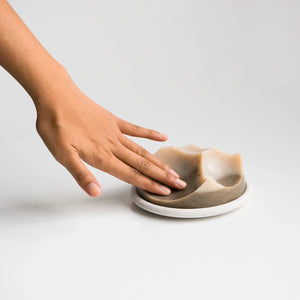 A cardamom vetiver architectural soap, made by hand by UME studios