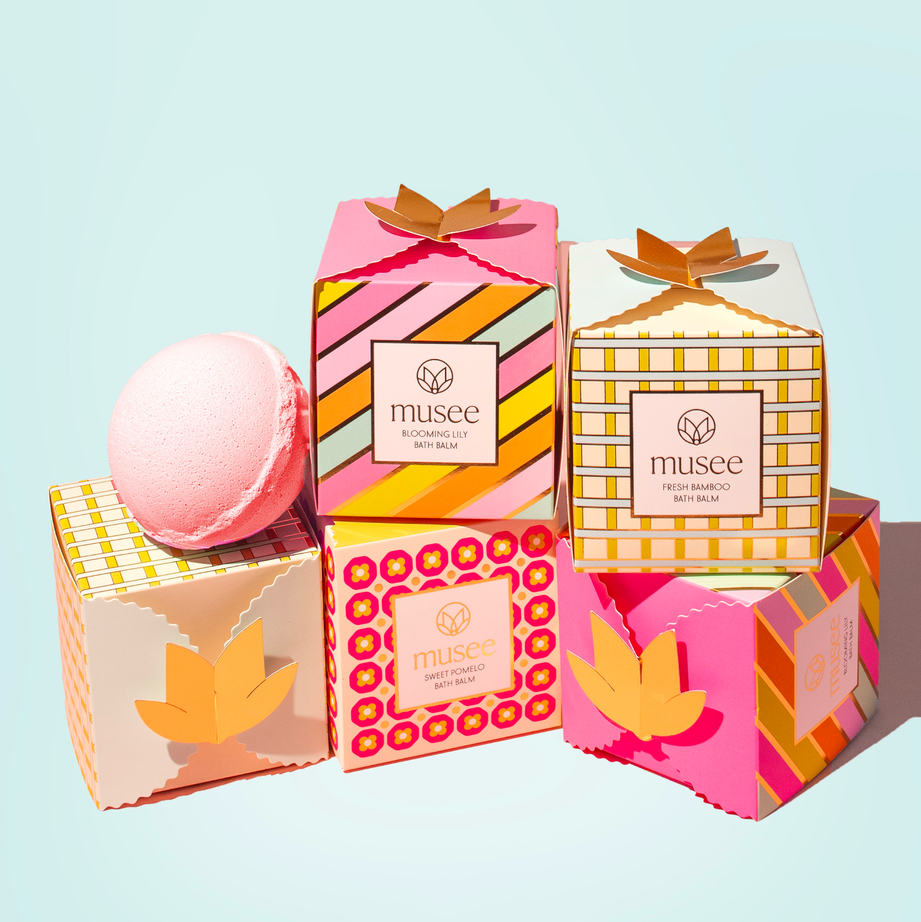 Bath balm with a decorative box featuring the brand 'musee' on a white background