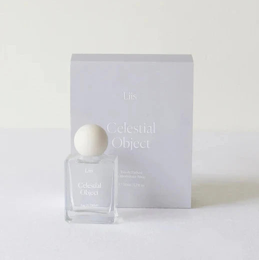 Perfume bottle labeled 'Celestial Object' on a white background