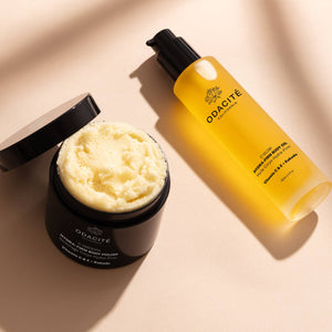 Skincare products with cream and bottle on neutral background