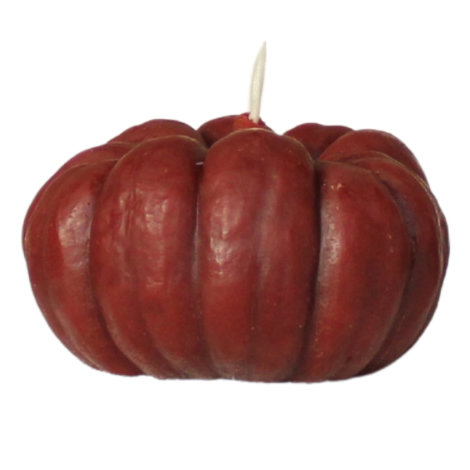 Red pumpkin-shaped candle on a white background