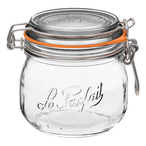 A clear glass Le Parfait rounded storage jar with an orange lid and a stainless steel wire clamp.