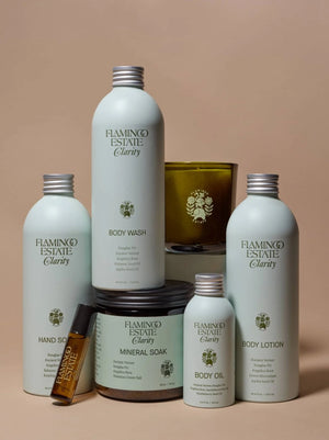 Flamingo Estate's Clarity product suite, various light blue aluminum bottles and green lass vessels.