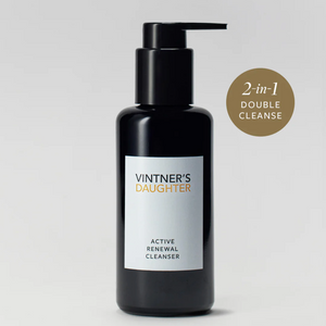 A pump bottle of Vintner's Daughter Active Renewal Cleanser, with a label that reads 'ACTIVE RENEWAL CLEANSER' and indicates a 'DOUBLE CLEANSE' process. The background is white and clean.
