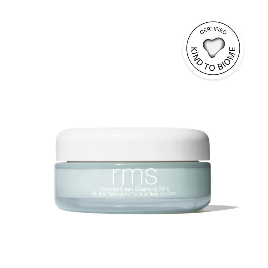 A light blue container of coconut cleansing balm, with a white lid