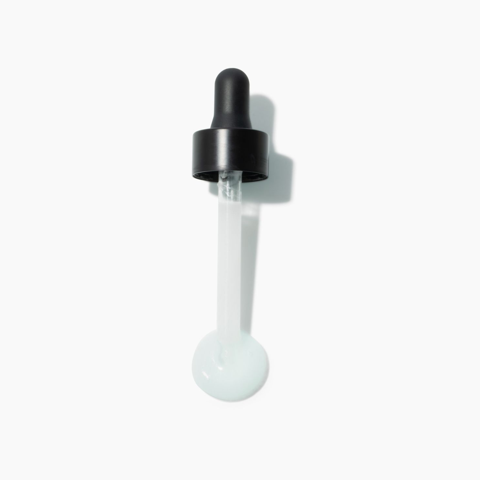TEN OVER TEN cuticle eraser bottle and packaging on a white background